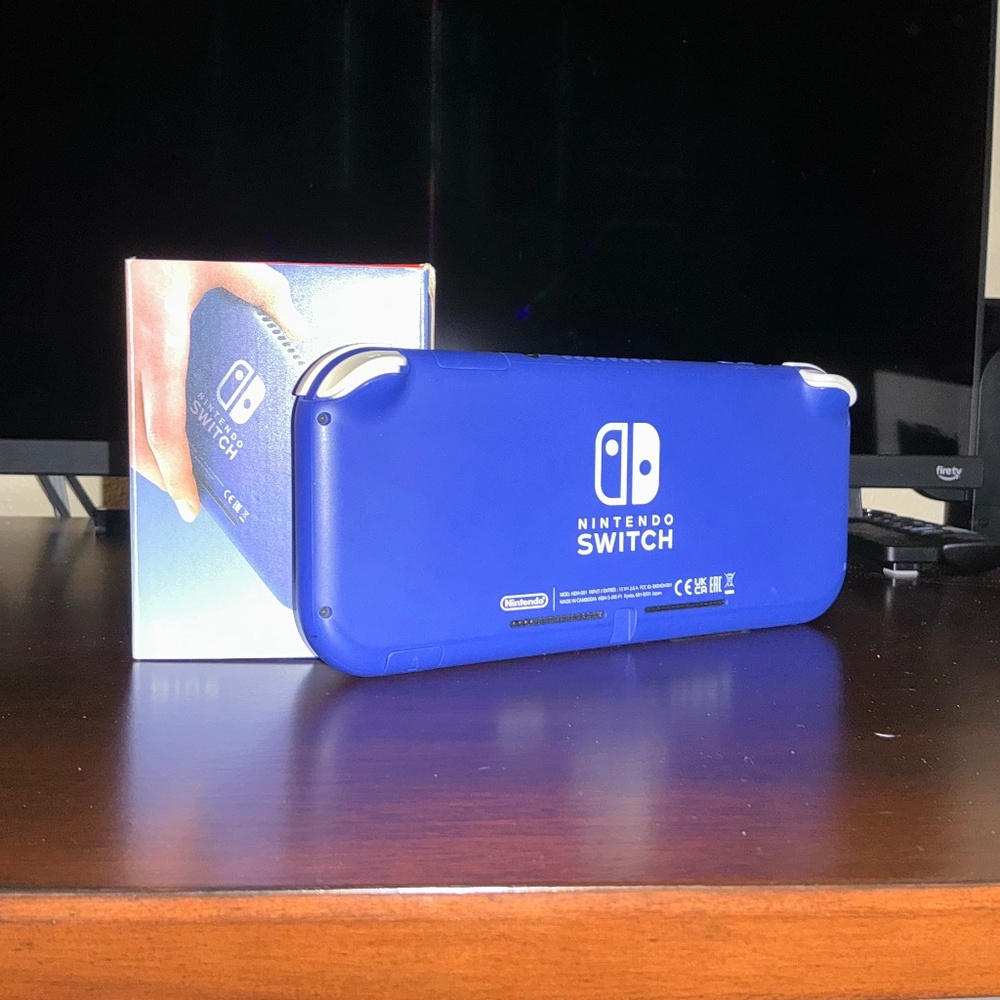 Nintendo Switch Lite used with box.  Scammers will be deleted and blocked.